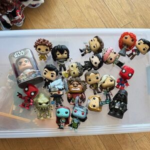 Funko Pop Vinyl Figures Assortment with Red, Blue, and Black Accents